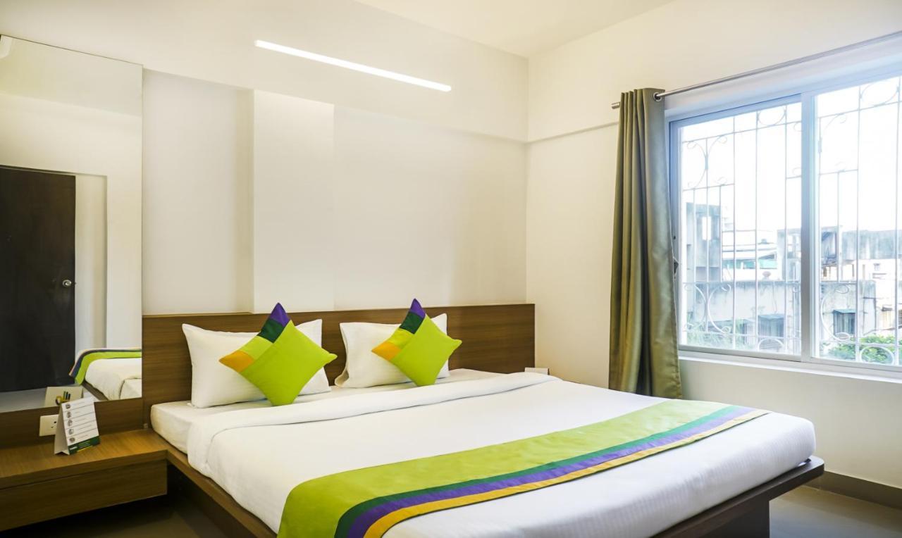 Treebo Luxe Suite, Shivaji Nagar Pune Bagian luar foto